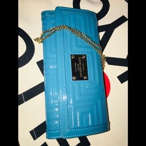 versace sling wallet!!it has a metal strap!